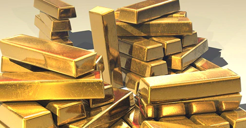 Gold price gains on weaker dollar, silver at Rs 63,700